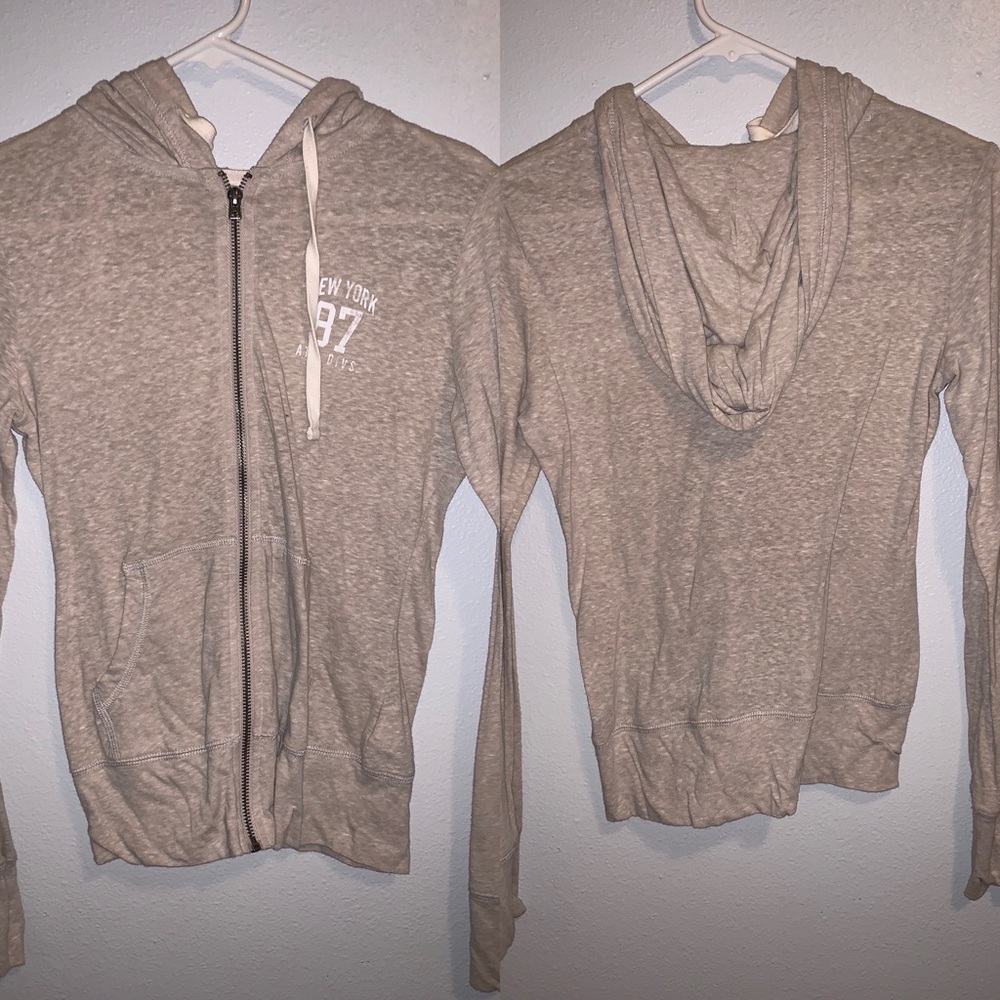 Tan zip up